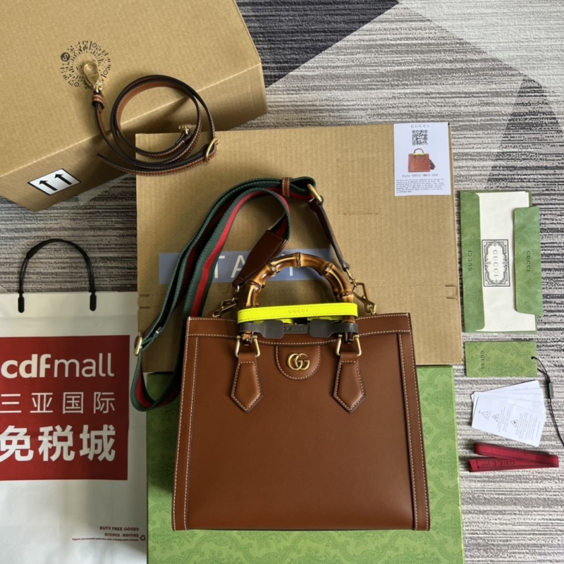 G*u*i top handle bags